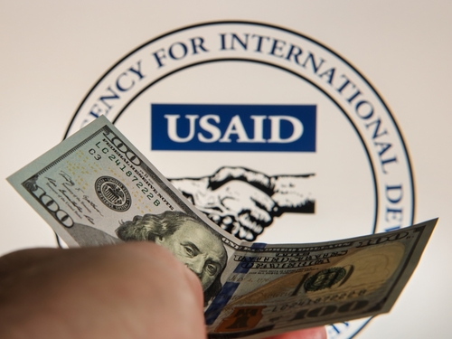 Averting immediate showdown, chief justice pauses judge’s deadline for US to restore foreign-aid funds